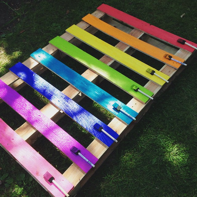 Create a brightly colored upcycled rainbow pallet planter project with these simple instructions from Hello Creative Family. A great family weekend project.