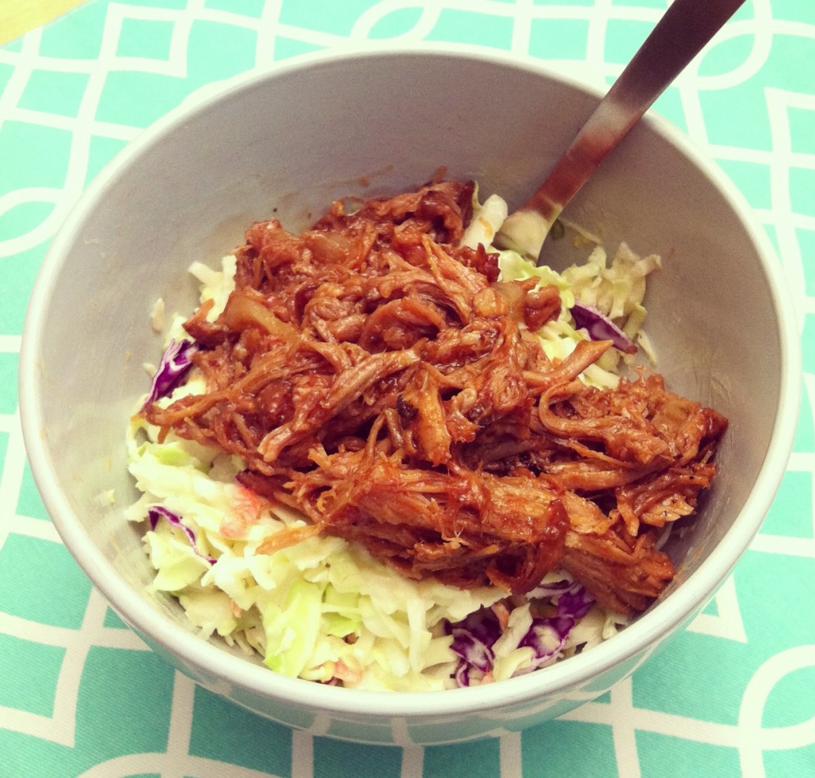 The best pulled pork recipe around! Set your crockpot in the morning and come home to soda pop pulled pork sandwiches! Can be made with root beer, dr. pepper, coke, pepsi or any other cola or pop that you love!