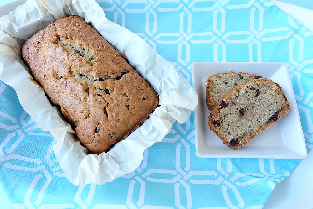 We're not exaggerating when we say that this is the BEST Chocolate Chip Zucchini Bread Recipe you'll ever taste! Give it a try and tell us if you agree! This family friendly recipe is one that we've been baking for years and we know that your family will love it just as much as ours does! #Baking #Recipe #Zucchini #Bread