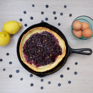 This mouthwatering, easy Dutch Baby Pancakes uses simple ingredients-- milk, eggs, flour, butter and sugar to make a family friendly breakfast you will love. Quick and easy to prep, perfect for breakfast, brunch, breakfast for dinner or a midday snack! #Recipe #SimpleRecipe #Eggs #RealFood #Pancakes #DutchBabyPancakes