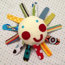 Mr Sun Fabric Scrap Busting Baby Teething Toy Tutorial from Hello Creative Family