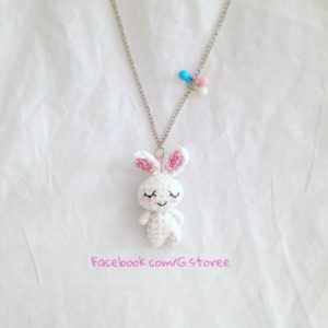 Adorable Spring and Easter Crochet Patterns Perfect For Easter Baskets: Sleeping Bunny Tiny Amigurumi Charm Pattern from Gstore Patterns