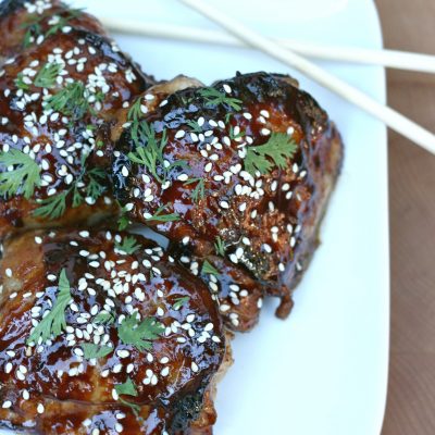 This quick and easy sticky chicken recipe is the perfect family friendly 30 minute meal! East meets west with the flavors of hoisin, sesame, garlic, ginger, balsamic & honey! #Chicken #Recipe #30minutemeal