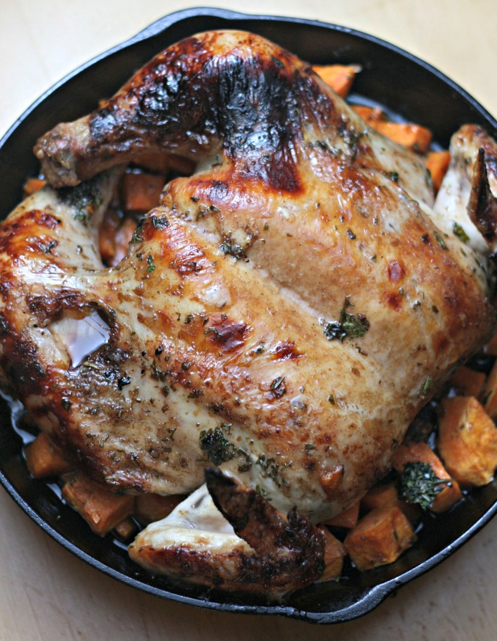 Have you ever butterflied a chicken? Butterflying your chicken makes it possible to have a whole roasted chicken on your table in 45 minutes! Here is a delicious recipe for Balsamic Butterflied Chicken with Sweet Potatoes made in a cast iron skillet.