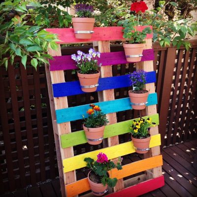Create a bright and colorful upcycled rainbow pallet planter project with these simple instructions from Hello Creative Family. A great family weekend project that kids will love.