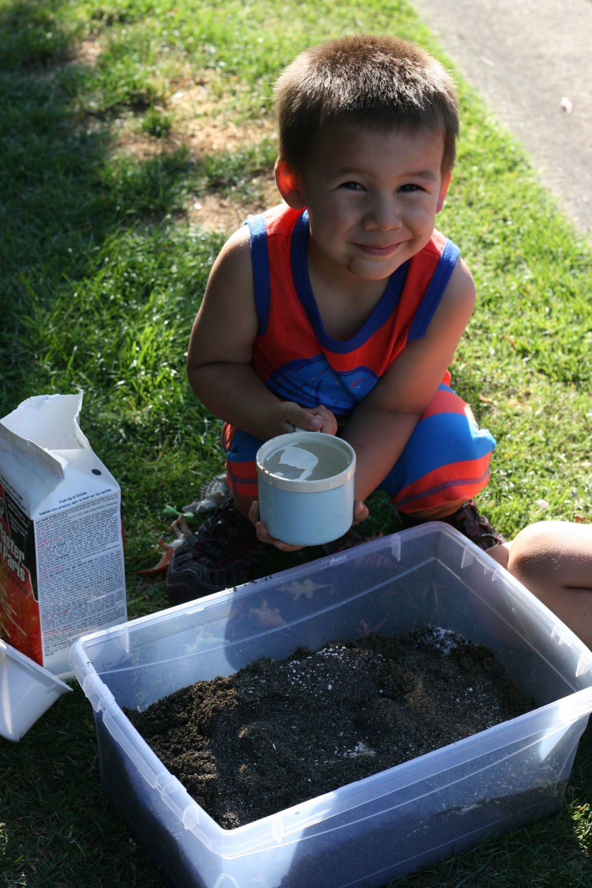 Make your own dinosaur excavation sensory bin. Perfect for palaeontologists to be