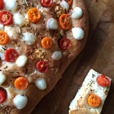 A good bread recipe should be a staple in every kitchen! Learn how to make our homemade focaccia bread recipe and modify it with flavors like cherry tomatoes and bocconcini