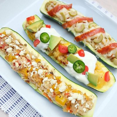 Looking for a 30 minute meal dinner idea? Whether you are craving pizza, tacos or meatless monday this easy stuffed zucchini recipe has 3 variations to keep your whole family satisfied.