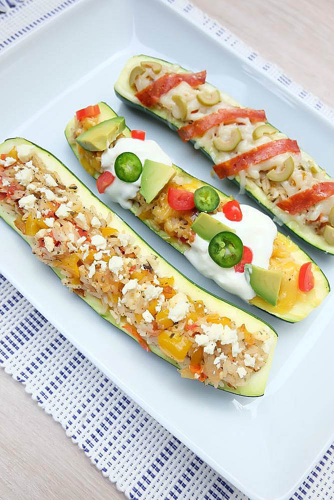 Looking for a 30 minute meal dinner idea? Whether you are craving pizza, tacos or meatless monday this easy stuffed zucchini recipe has 3 variations to keep your whole family satisfied.