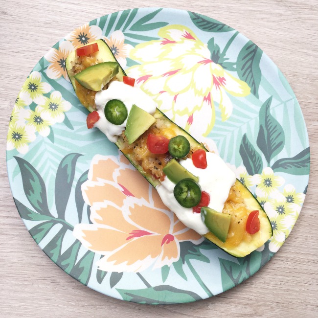 Looking for a 30 minute meal dinner idea? Whether you are craving pizza, tacos or meatless monday this easy stuffed zucchini recipe has 3 variations to keep your whole family satisfied.