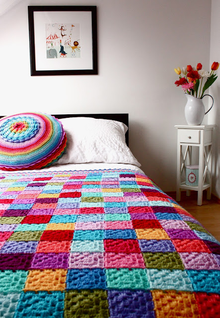 27 Crochet Projects That Are Going To Make You Want To Learn How To Crochet: Rainbow Granny Square Blanket from Boys and Bunting