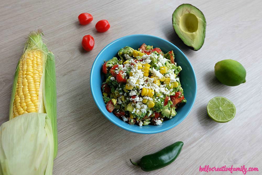 With a bit of heat, a dash of sweet and sour, a sprinkle of salty and a lovely creaminess from the avocado, this recipe is sure to be a hit with everyone who loves a good guacamole. Serve this festive sweet corn guacamole recipe with chips, burritos, fajitas, tacos and tamales or as a topping on chicken or fish!