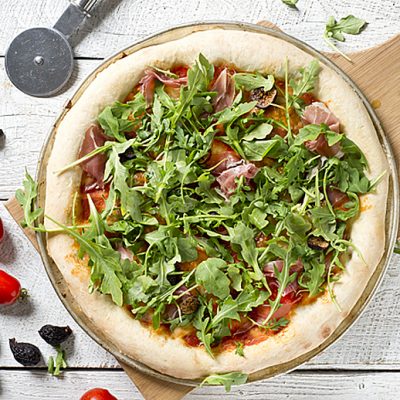 On a recent trip to New York I had the most delicious pizza I've ever tasted. I've recreated this New York experience for you all to try! This homemade Fig and Prosciutto Pizza Recipe will make the most delicious pizza you've ever tasted!