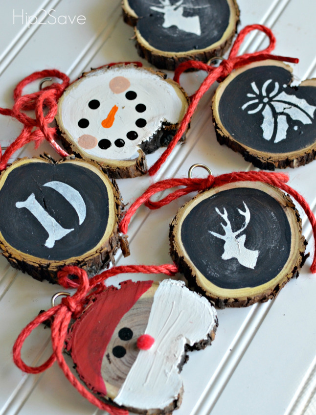 27+ DIY Christmas Ornaments Kids Can Craft- DIY Rustic Sliced Wood Santa, Snowman and Other Christmas Design Ornaments from Hip 2 Save