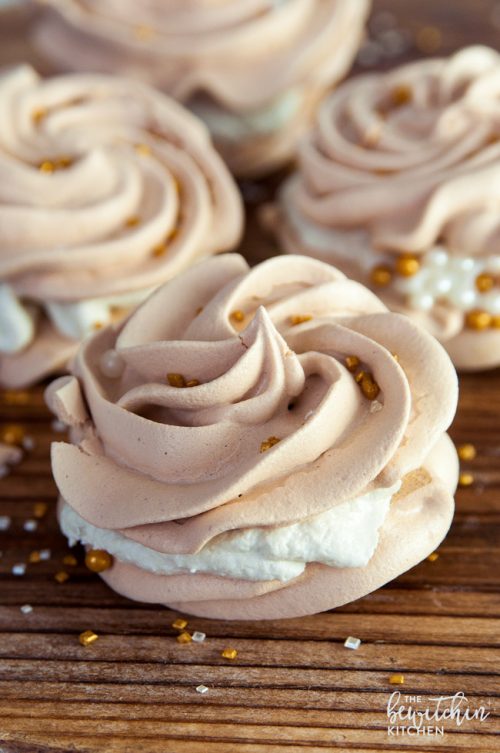 27+ Cookie Recipes Perfect For Christmas Cookie Exchanges- Christmas Merignues with Eggnog Buttercream from The Bewitchin Kitchen