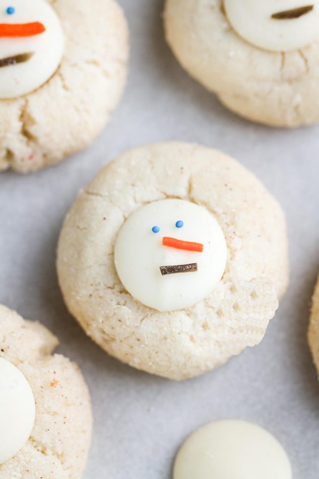 27+ Cookie Recipes Perfect For Christmas Cookie Exchanges- Snowman Thumbprint Cookie Recipe (and other thumbprint cookie ideas) from Life Made Sweeter