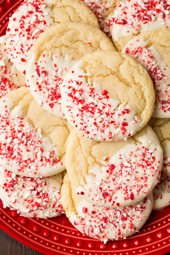 27+ Cookie Recipes Perfect For Christmas Cookie Exchanges- White Chocolate Dipped Peppermint Sugar Cookies Recipe from Cooking Classy