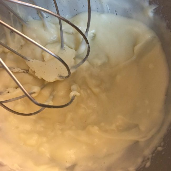 A solidified mixture of coconut oil, cacao butter, beeswax and shea butter that has been cooled in the refridgerator.