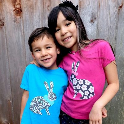 Easter is just around the corner! Dress your kids up for Easter with these adorable easy DIY Easter Shirts made on the Cricut. This fun Cricut Explore Project can be customized by letting your kids pick out the fabric. Includes instruction on how to cut fabric with the Cricut.