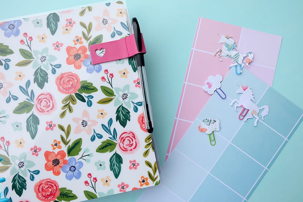 Make pretty unicorn and cloud clips using scrapbook paper and colorful paperclips! This craft project is so easy and perfect for marking the page of your Happy Planner or bullet journal or to use as a bookmark for your favorite novel! Super Simple DIY Unicorn Planner Bookmarks!