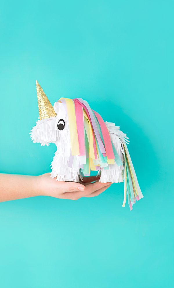75+ Magically Inspiring Unicorn Crafts, DIYs, Foods and Gift Ideas: Unicorn Pinata from A Subtle Revelry