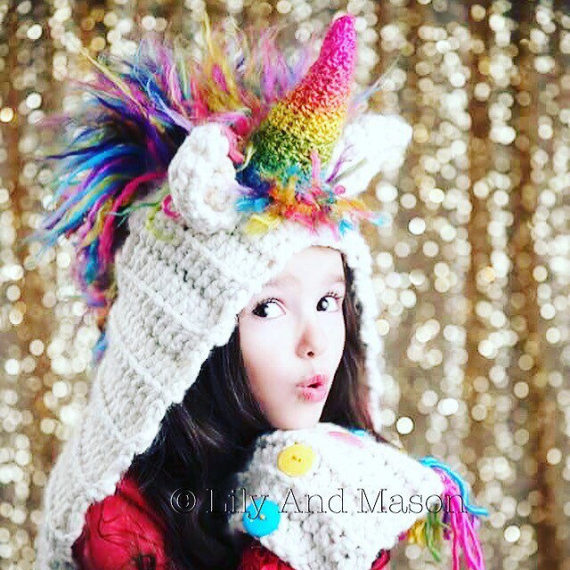 75+ Magically Inspiring Unicorn Crafts, DIYs, Foods and Gift Ideas: Unicorn Rainbow Hood Crochet Pattern from Lily and Mason Boutique