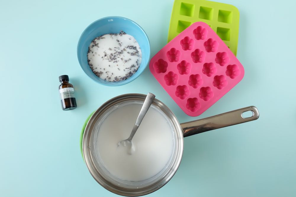 Making DIY body products at home is so much fun. Here is an easy project to get you started! These DIY Coconut Lavender Sugar Scrub Bars use shea butter melt and pour soap as their base. Perfect for exfoliating in the shower, or to use on feet and hands before a pedicure or manicure! Super simple to make and a fabulous handmade gift idea! 
