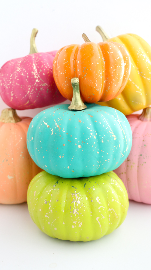 27+ Awesome Pumpkin Crafts, DIYs and Decorating Ideas- DIY Gold Splatter Painted Pumpkins from A Kailo Chick Life