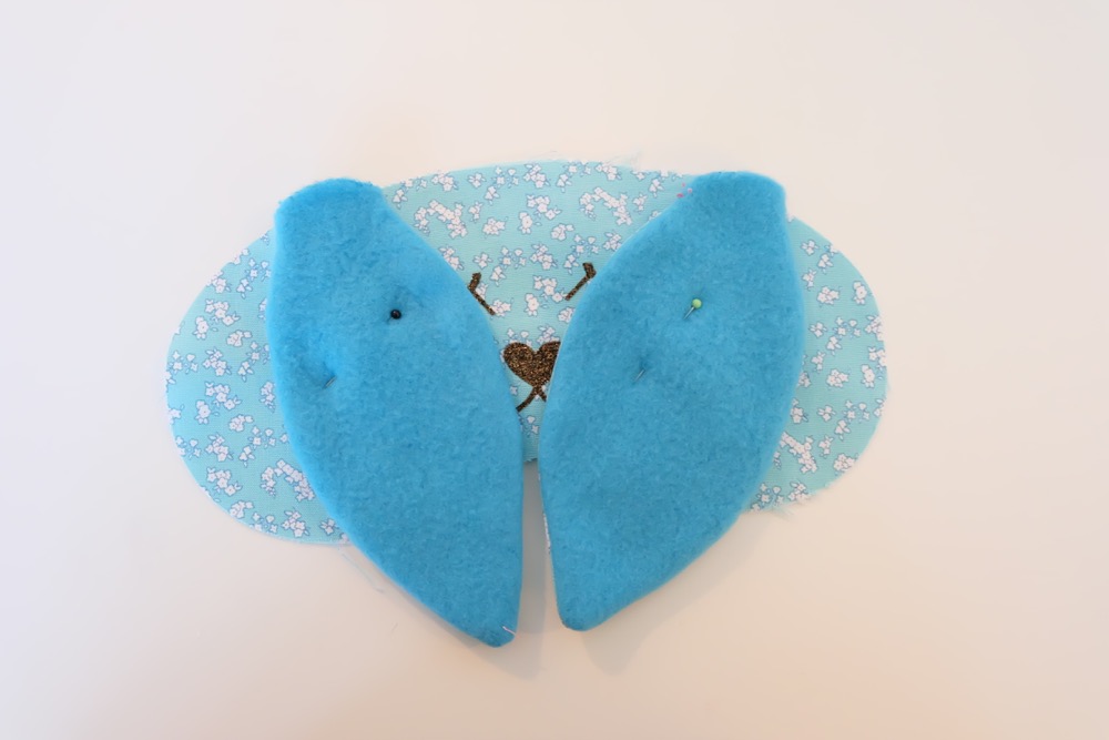 This 30 Minute Bunny Sleep Mask Sewing Tutorial is just about as cute as can be! Its easy to make and would make an adorable handmade gift idea for teens or tweens and would be perfect for birthday party or slumber party favors! Free cut file provided using the Cricut Maker or Cricut Explore. I have to make this Cricut project next! #sponsored #CricutMade #CricutMaker