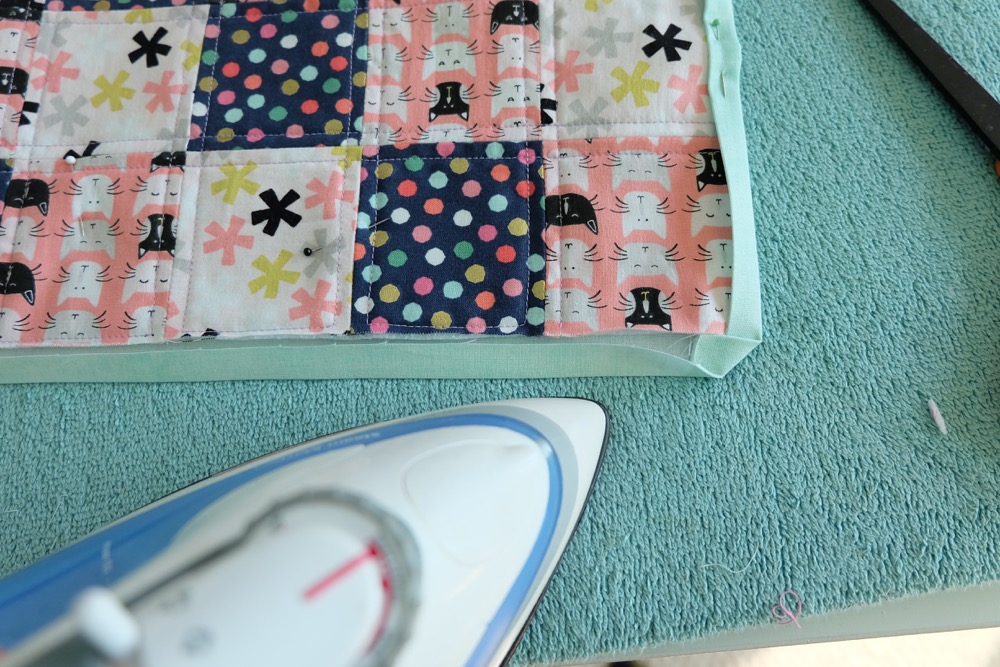 Bigger than a coaster and smaller than a placemat, a mug rug is a great handmade gift for coffee and tea drinkers! A great sewing project for beginners, this fabric scrap mug rug tutorial is easy and inexpensive to make! Cut the fabric with your Cricut Maker or by hand! #sewing #diy #craft #Cricutmaker