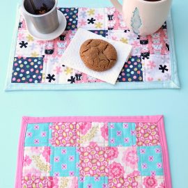 Bigger than a coaster and smaller than a placemat, a mug rug is a great handmade gift for coffee and tea drinkers! A great sewing project for beginners, this fabric scrap mug rug tutorial is easy, with step by step photos and inexpensive to make! Cut the fabric with your Cricut Maker or by hand! #sewing #diy #craft #Cricutmaker