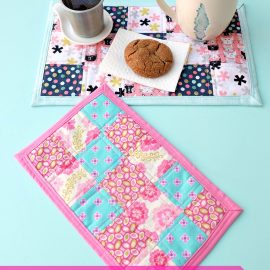 Bigger than a coaster and smaller than a placemat, a mug rug is a great handmade gift for coffee and tea drinkers! A great sewing project for beginners, this fabric scrap mug rug tutorial is easy, with step by step photos and inexpensive to make! Cut the fabric with your Cricut Maker or by hand! #sewing #diy #craft #Cricutmaker