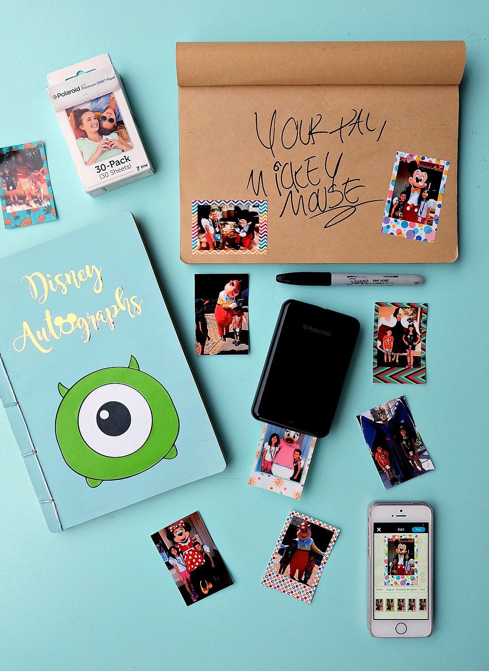 Make every penny count on your next trip to Disneyland or Disney World with this easy Disneyland Autograph Book with Photo Stickers! Turn a dollar store notebook into an awesome keepsake! Load it with fun sticker back photos of your kids posing with their favorite Disney characters! Great for those trying to stick to a budget during their Disney travel plans! #Disney #DIY #Crafts