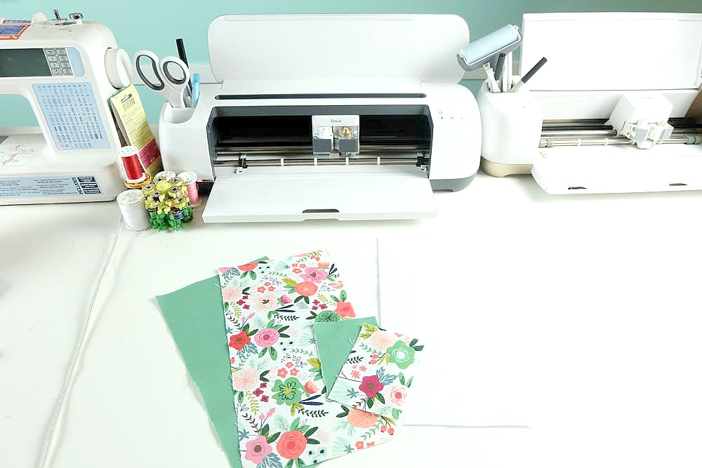 Know someone who loves to travel? This 30 minute DIY passport holder sewing tutorial makes a lovely handmade gift for anyone who has the travel bug! Customize it with your favorite fabric. The passport holder has a pocket to hold extra ID. This project tutorial has step by step photos making it so easy to make at home. Also comes with a free Cricut cut file for if you want to cut your fabric with the Cricut Maker. #sewing #craft #DIY #travel #cricutmaker