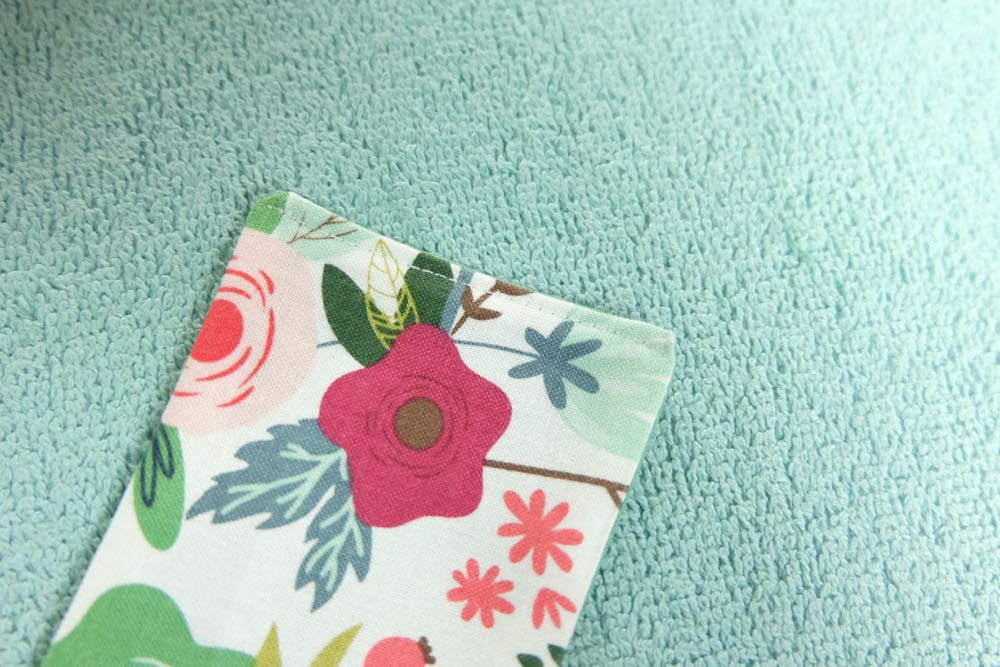 Know someone who loves to travel? This 30 minute DIY passport holder sewing tutorial makes a lovely handmade gift for anyone who has the travel bug! Customize it with your favorite fabric. The passport holder has a pocket to hold extra ID. This project tutorial has step by step photos making it so easy to make at home. Also comes with a free Cricut cut file for if you want to cut your fabric with the Cricut Maker. #sewing #craft #DIY #travel #cricutmaker