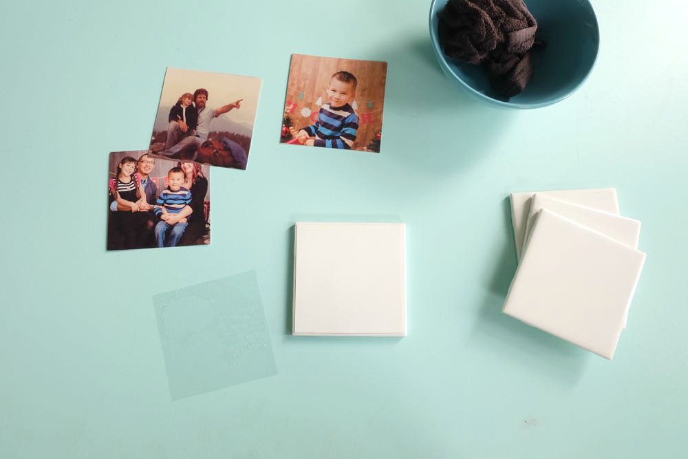 Turn your favorite family photos into gorgeous DIY photo coasters! This project is an easy handmade gift idea that costs less than $5.00 to make! Perfect for DIY gifts for moms, dads, grandmas and grandpas for Christmas, birthdays, Mother's day and Father's Day! This tutorial has step by step photos and instructions. #handmadegift #craft #diy #photography