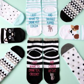 The perfect handmade gift idea for dog and cat lovers! These DIY dog and cat themed "If You Can Read This Socks" are easy to make using a Cricut Maker or Cricut Explore and turn out so cute! Change the wording using our free Cricut Cut File! This is an adorable stocking stuffer idea under $5.00! Perfect for Easter Basket Stuffers too! #cricutmaker #cricutmade #cricutproject #stockingstuffer
