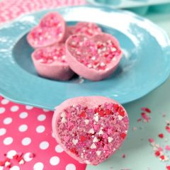 These Easy DIY Candy Heart Bath Bombs are scented like cotton candy and are just about as sweet as can be! They would make the best handmade gift idea for Valentine's Day, teacher's gifts, mother's day, birthday's, birthday party favors or shower favors! Fun and simple to make! Even kids can help with these heart shaped bath bombs! #bodyproducts #beauty #handmadegiftidea #DIY #Valentinesday #bathbombs #DIYBathBombs