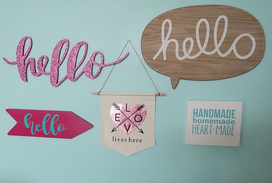 Canvas Wall Banners are so hot right now! Learn how to make a DIY Canvas Wall Banner in just 20 minutes with this easy sewing tutorial! Includes a free Cricut Cut File for making this Love Lives Here Banner on the Cricut Maker or Cricut Explore! Perfect for decorating a family photo wall or as a front door wreath decoration for Valentines Day! #DIY #CricutMade #CricutMaker #Craft #Decor