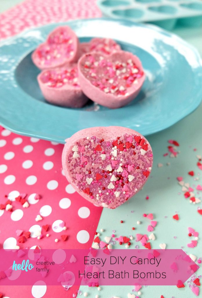 These Easy DIY Candy Heart Bath Bombs are scented like cotton candy and are just about as sweet as can be! They would make the best handmade gift idea for Valentine's Day, teacher's gifts, mother's day, birthday's, birthday party favors or shower favors! Fun and simple to make! Even kids can help with these heart shaped bath bombs! #bodyproducts #beauty #handmadegiftidea #DIY