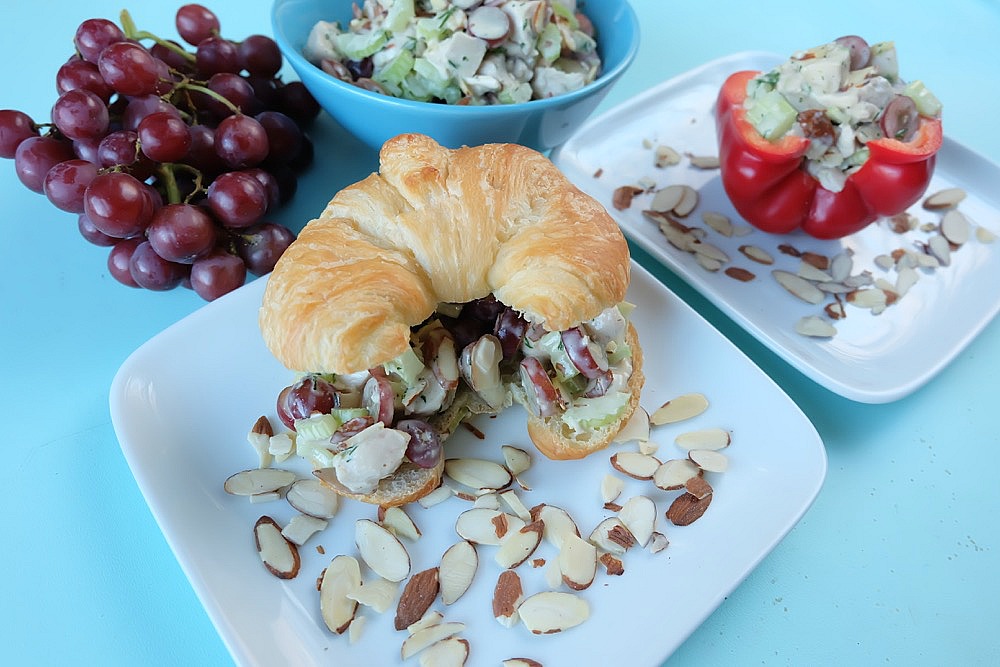 Your family is going to love this Napa Valley Turkey Salad Recipe! Whip up a big batch on meal planning days for easy lunches during the week. Creamy and slightly sweet with a great crunch from the almonds and celery this is a family favorite. Turkey salad sandwiches, wraps, and croissants are a few of our favorite ways to eat this recipe. For an extra healthy twist put your Napa Valley Turkey Salad in a bell pepper cup! #Recipe #lunch #mealplanning #sponsored 