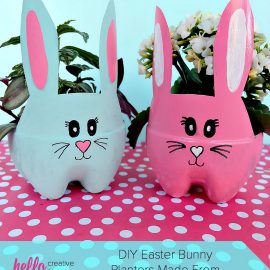 These DIY Easter Bunny Planters are made using recycled pop bottles! Bright and colorful they are a fun craft for a table centerpiece, front porch or handmade Easter gift idea! An easy upcycled kids Easter Craft to keep little ones occupied during spring break and to teach gardening skills. #Easter #Crafts #Upcycled HandmadeGift #Gardening