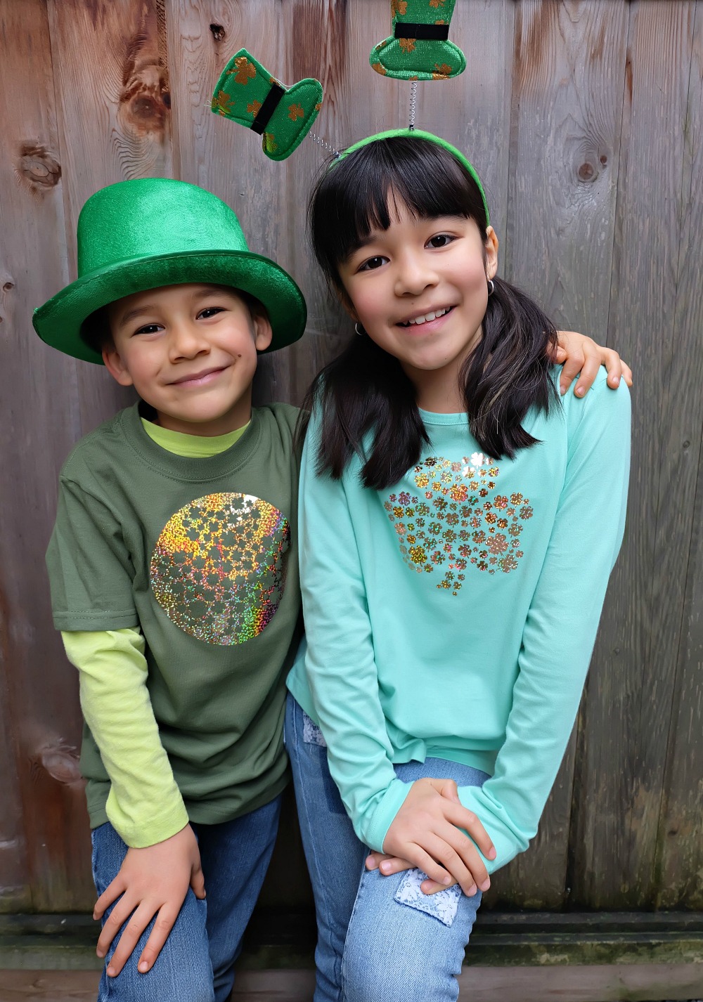 Celebrate St. Patrick's Day in style with this adorable DIY shamrock shirt! Make this project using your Cricut Maker or Cricut Explore. With this unique design one cut can make two shirts! Includes free cut file! A fun shirt for kids or adults! #cricutmade #cricutmaker #cricutholiday #KidsClothes
