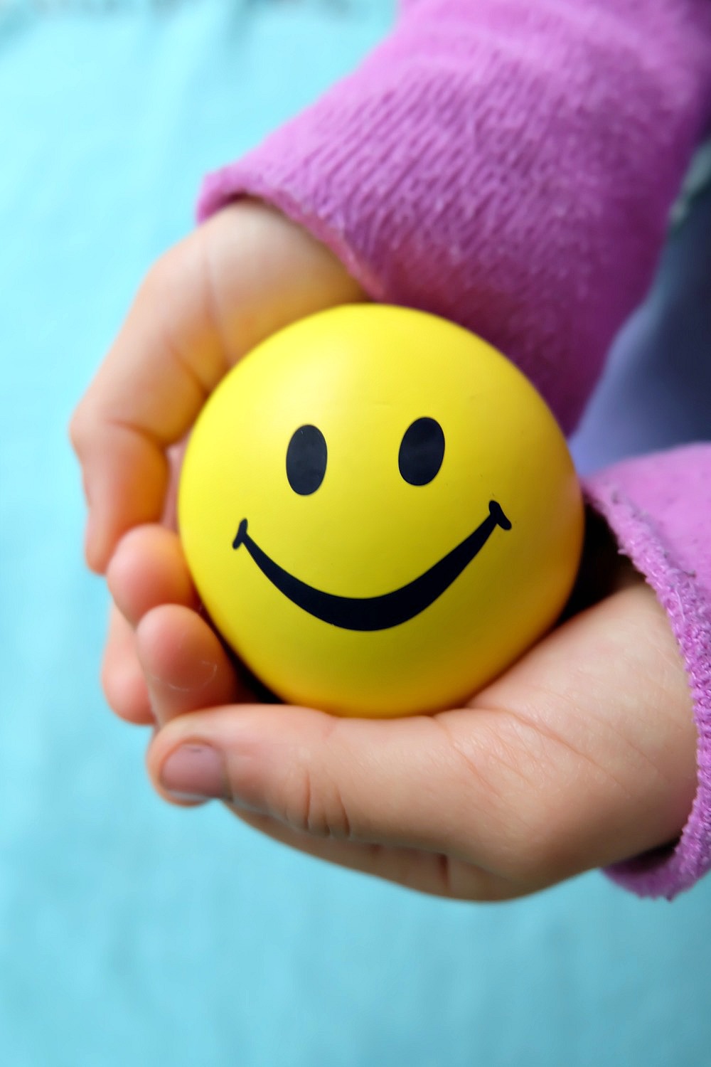 These easy DIY Emoji Squishy Stress Balls Filled With Slime take all of your kids favorite things and puts it into one fun kids craft! Emojis? Check! Squishies? Check! Slime? Check! Perfect for non-candy Easter Basket Stuffer ideas, Valentine's Day, Birthday Party Favors and more! Make using your Cricut or with balloons pre-printed with emojis or happy faces. #Crafts #PartyFavors #emojis #slime #Cricut