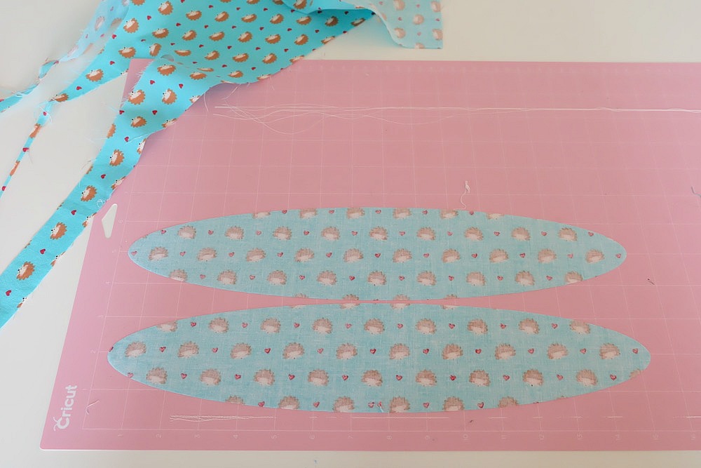 Bust out those fabric scraps and whip up this quick and easy sewing project! This 10 Minute Fabric Headband Sewing Tutorial will have you making a super cute hair accessory in minutes! Create this sewing project using the Cricut Maker. Also learn why a Cricut is the perfect tool if you are in a craft slump or want to learn to craft! #Cricut #sewing #hairaccessories #diy 