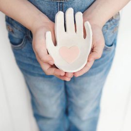 37+ Handmade Gift Ideas For Mom That She's Guaranteed To Love: DIY Child's Handprint Clay Jewelry Holder from Simple As That Blog