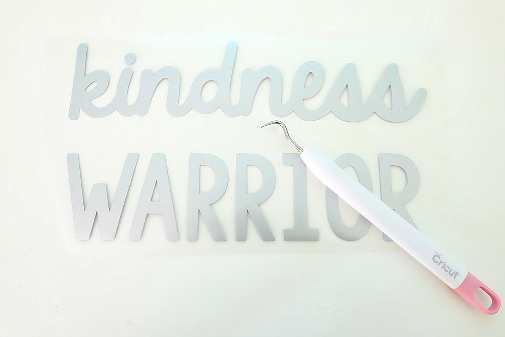 The world needs more kindness! Let's create an army of kindness with this easy to make DIY Kindness Warrior Shirt. Includes step by step instructions on how to make this project using a Cricut, along with a free SVG file compatible with Cricut or Silhouette. The perfect hoodie for kids or adults to spread love instead of hate, discourage bullying and make the world a better place. #DIY #Cricut #Silhouette #SVG 