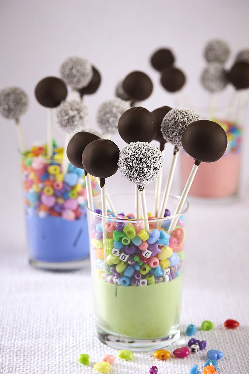 Looking for a delicious, nutritious, guilt free dessert idea? This Chocolate Chia Bliss Ball Pops Recipe is vegan, gluten-free and nut free! It's perfect for an easy, healthy birthday dessert idea and would be perfect for a nut-free school snack or treat! Recipe from the book The Wholesome Child. #Dessert #Recipe #GlutenFree #RealFood