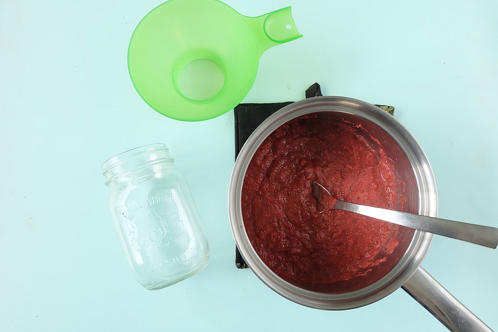 This quick and easy strawberry rhubarb chia jam takes two of my favorite flavors of summer and turns it into one healthy recipe! If you have never made jam before this is the recipe to start with. It uses chia seeds to thicken the jam and takes only 15 minutes start to finish to make! Family friendly, get the kids involved in the kitchen helping to make this delicious treat. Perfect for on bread, mixed with greek yogurt or as an ice cream topper! #Jam #chia #strawberry #rhubarb #recipe