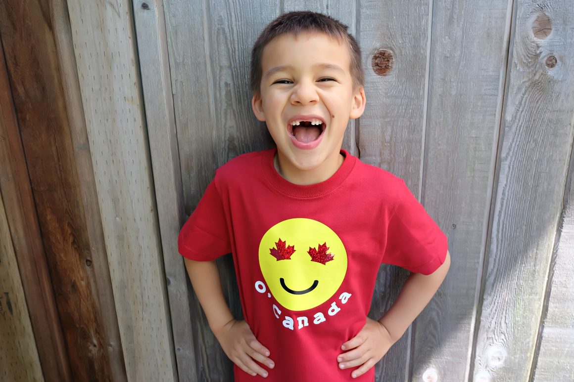 Celebrate your Canadian Patriotism and your love for emojis with one super cute shirt! This DIY Canada Emoji Shirt has maple leafs for the eyes and is perfect for Canada Day. Includes step by step instructions and photos along with the cut file. Perfect for making with your Cricut Explore Air or your Cricut Maker. Get crafting! #CricutMade #emojis #Cricut #CanadaDay #DIY 
